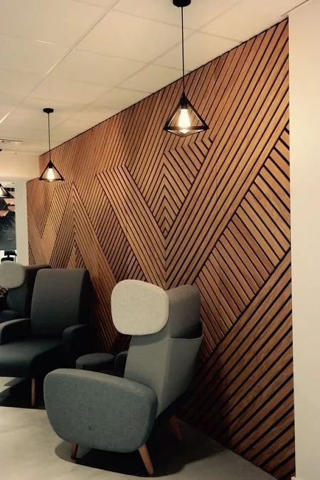 wooden wall with chairs and lighting lamps